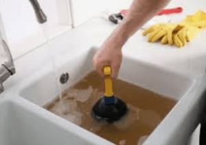 What causes clogged drains?